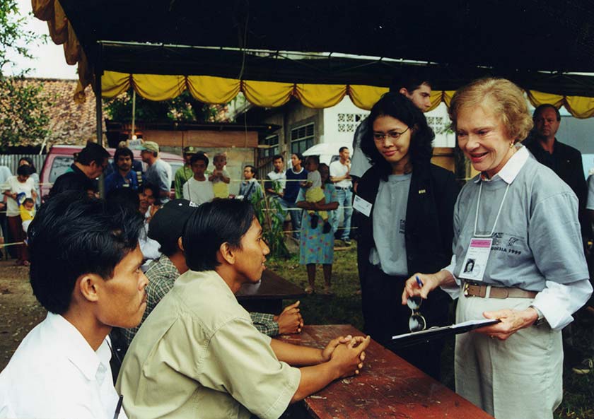 Photo of Rosalynn Carter observing voting at an Indonesian polling station in 1999.