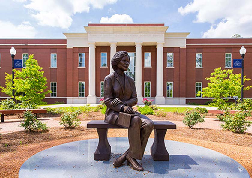 Photo of statue of former First Lady Rosalynn Carter located at Georgia Southwestern State University.